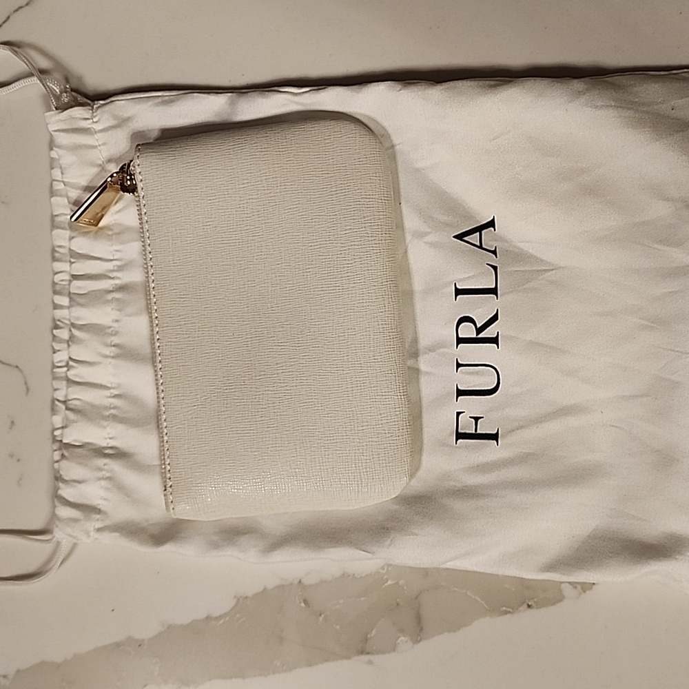 Small white Furla change purse